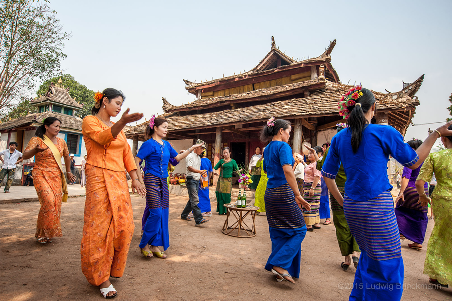 Picture: Dances at a village temple south of Menglian on the eve of the Watersplashing Festival.