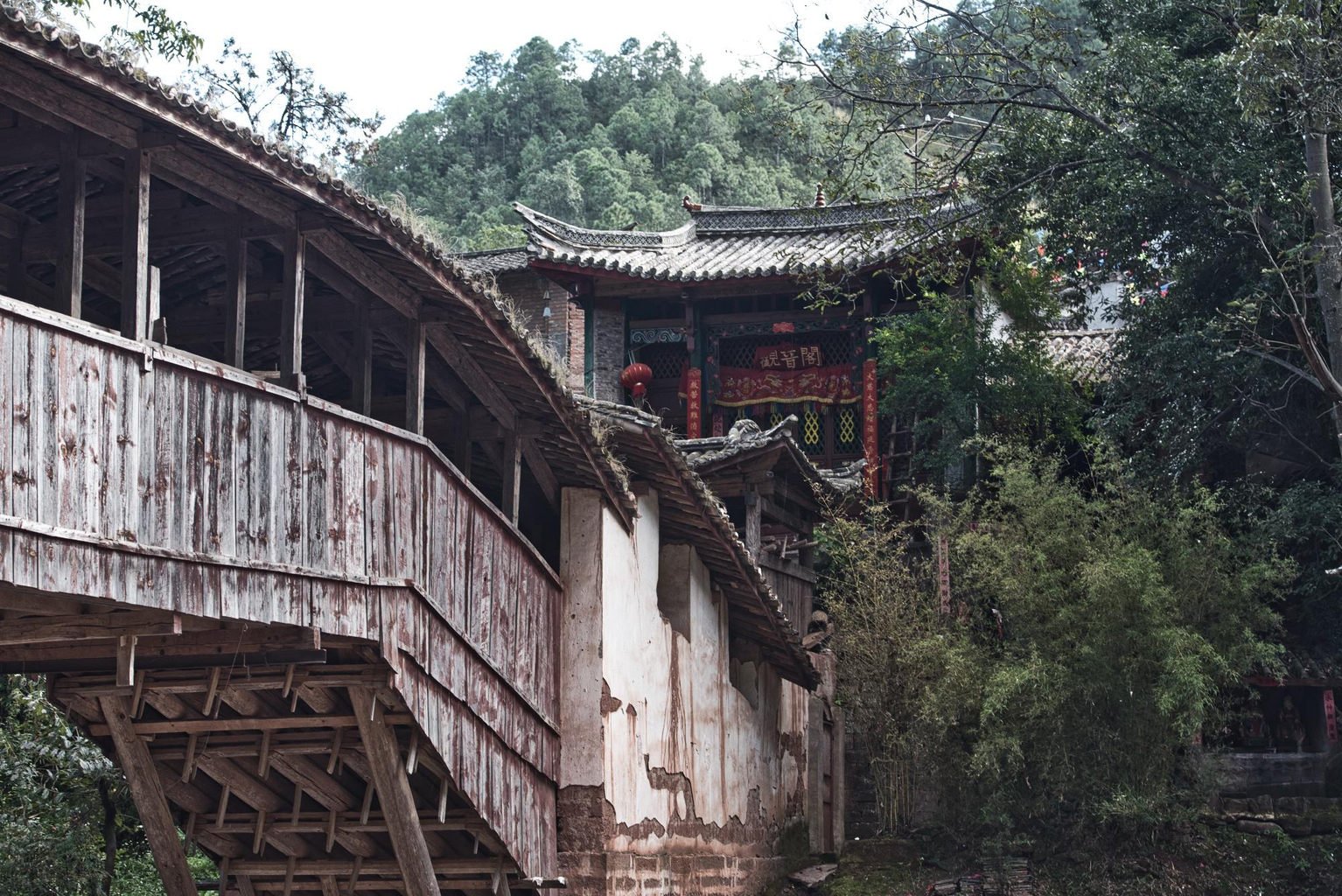 Picture: Traditional style covered wooden bridge in Yunlong county.
